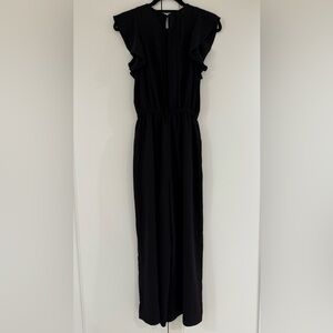 Wilfred Black Ruffle Jumpsuit